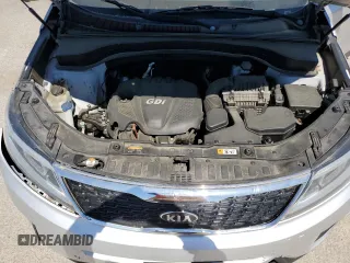 2014 Kia Sorento LX z VIN 5XYKT3A65EG443704, wystawiony jako Copart lot #50705745 z przebiegiem 132 339 mil mil oraz Szkoda całkowita • Salvage title. Historia ofert i sprzedaży dostępna na DreamBid. Obrazek 13.