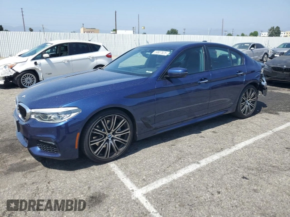 2018 BMW 5 Series 540i with VIN WBAJE5C51JWA94673, listed as a Copart auction lot 59807825 with 77,051 mi miles and Salvage title. Bid and sale history available at DreamBid. Image 1.