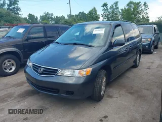 2004 Honda Odyssey EX-L with VIN 5FNRL189X4B045459, listed as a IAAI auction lot 42628246 with 181,328 mi miles and . Bid and sale history available at DreamBid. Image 6.