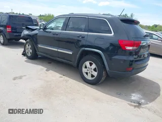 2011 Jeep Grand Cherokee Laredo z VIN 1J4RR4GG0BC547689, wystawiony jako IAAI lot #42230005 z przebiegiem 192 361 mil mil oraz . Historia ofert i sprzedaży dostępna na DreamBid. Obrazek 3.