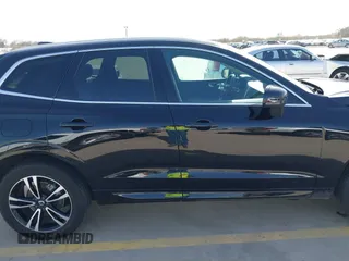 2020 Volvo XC60 Momentum z VIN YV4102RK9L1474206, wystawiony jako IAAI lot #41731881 z przebiegiem 77 908 mil mil oraz . Historia ofert i sprzedaży dostępna na DreamBid. Obrazek 13.