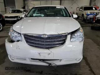 2010 Chrysler Sebring Limited z VIN 1C3CC5FD8AN162043, wystawiony jako Copart lot #68384784 z przebiegiem 71 477 mil mil oraz Szkoda całkowita • Salvage title. Historia ofert i sprzedaży dostępna na DreamBid. Obrazek 5.