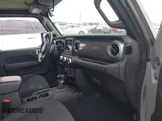 2021 Jeep Gladiator High Altitude z VIN 1C6HJTFG1ML597807, wystawiony jako IAAI lot #42336812 z przebiegiem 46 450 mil mil oraz . Historia ofert i sprzedaży dostępna na DreamBid. Obrazek 5.