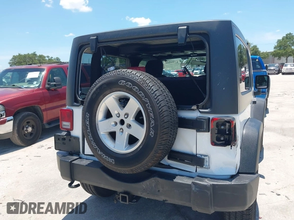 2013 Jeep Wrangler Sport with VIN 1C4AJWAG0DL542624, listed as a IAAI auction lot 42590160 with 54,850 mi miles and . Bid and sale history available at DreamBid. Image 6.