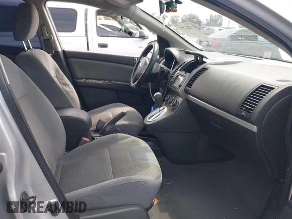 2012 Nissan Sentra S with VIN 3N1AB6AP9CL651179, listed as a IAAI auction lot 42022927 with 144,235 mi miles and . Bid and sale history available at DreamBid. Image 5.