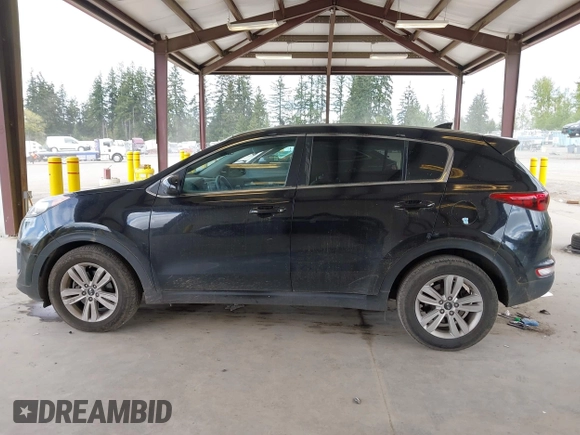 2018 Kia Sportage LX with VIN KNDPM3AC7J7463078, listed as a IAAI auction lot 42086356 with 75,406 mi miles and . Bid and sale history available at carsss.com. Image 14.