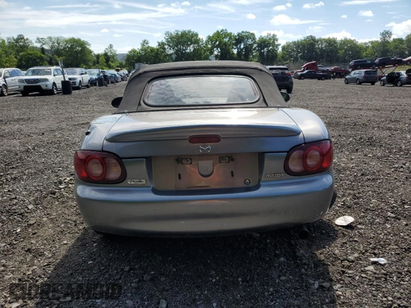 2002 Mazda MX-5 Miata Cloth z VIN JM1NB353520224582, wystawiony jako Copart lot #63669835 z przebiegiem 88 455 mil mil oraz Szkoda całkowita • Salvage title. Historia ofert i sprzedaży dostępna na DreamBid. Obrazek 6.
