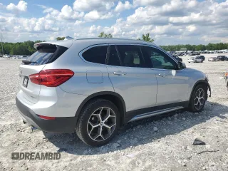 2018 BMW X1 sDrive28i z VIN WBXHU7C39J3F04591, wystawiony jako Copart lot #56824545 z przebiegiem 62 990 mil mil oraz Szkody całkowita. Historia ofert i sprzedaży dostępna na DreamBid. Obrazek 3.