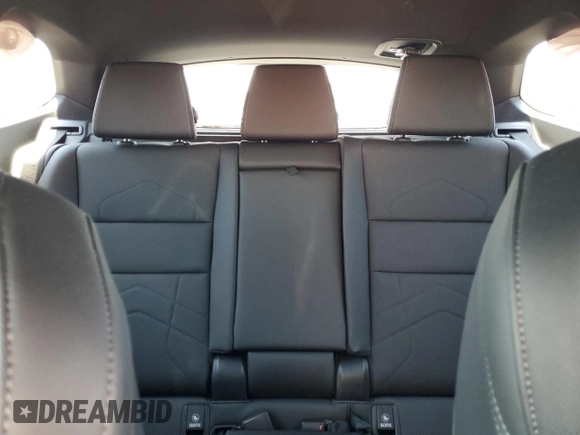 2023 BMW X1 xDrive28i with VIN WBX73EF03P5W54209, listed as a Copart auction lot 64796365 with 19,591 mi miles and Salvage title. Bid and sale history available at DreamBid. Image 10.