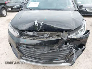 2020 Chevrolet Trax LT with VIN 3GNCJLSB8LL293414, listed as a IAAI auction lot 42714496 with 34,038 mi miles and . Bid and sale history available at DreamBid. Image 6.