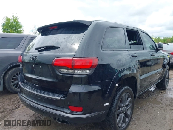 2018 Jeep Grand Cherokee Overland z VIN 1C4RJFCT2JC234220, wystawiony jako IAAI lot #42240365 z przebiegiem 84 753 mil mil oraz . Historia ofert i sprzedaży dostępna na DreamBid. Obrazek 4.