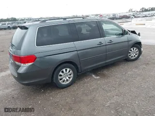 2010 Honda Odyssey EX-L with VIN 5FNRL3H78AB113568, listed as a IAAI auction lot 41181639 with 132,130 mi miles. Bid and sale history available at carsss.com. Image 4.