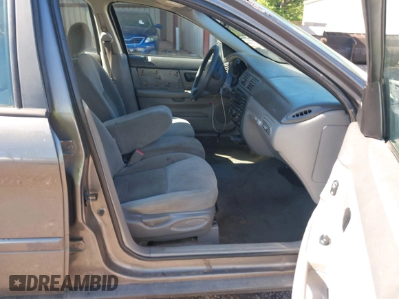 2005 Ford Taurus SE with VIN 1FAFP532X5A272398, listed as a IAAI auction lot 42001798 with 159,199 mi miles. Bid and sale history available at carsss.com. Image 5.