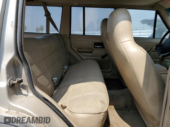 1996 Jeep Cherokee Sport with VIN 1J4FJ68S4TL146513, listed as a Copart auction lot 71039984 with 330,765 mi miles and Clean Title. Bid and sale history available at carsss.com. Image 11.