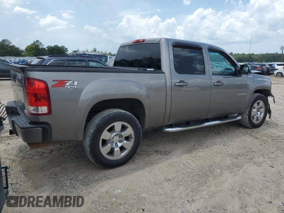 2013 GMC Sierra 1500 SLT with VIN 3GTP2WE25DG134770, listed as a Copart auction lot 59616535 with 212,304 mi miles and Salvage title. Bid and sale history available at DreamBid. Image 3.