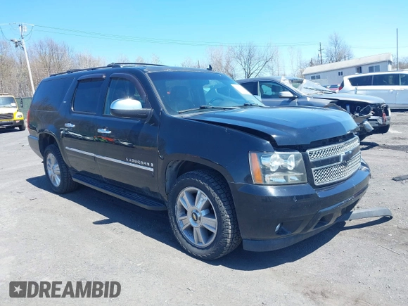 2009 Chevrolet Suburban LTZ with VIN 1GNFK36399J124158, listed as a IAAI auction lot 42063097 with 204,856 mi miles. Bid and sale history available at carsss.com. Image 1.