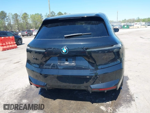 2024 BMW iX M60 z VIN WB533CF06RCN40621, wystawiony jako IAAI lot #42005612 z przebiegiem 11 051 mil mil oraz . Historia ofert i sprzedaży dostępna na DreamBid. Obrazek 16.