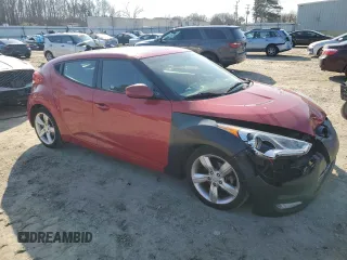 2014 Hyundai Veloster z VIN KMHTC6AD3EU217143, wystawiony jako Copart lot #43716395 z przebiegiem 137 865 mil mil oraz Szkoda całkowita • Salvage title. Historia ofert i sprzedaży dostępna na DreamBid. Obrazek 4.