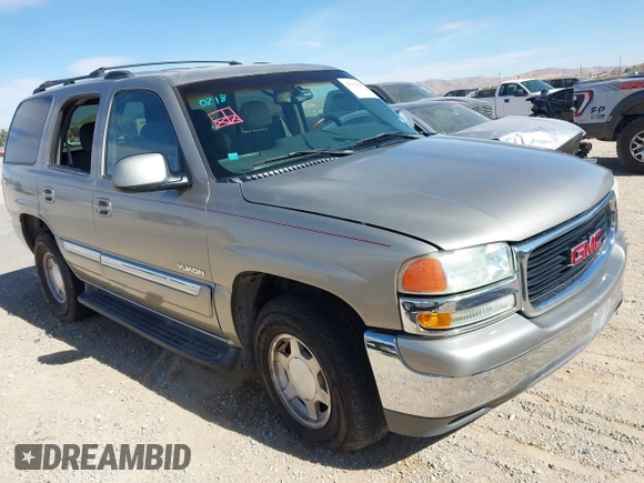 2003 GMC Yukon SLT with VIN 1GKEC13V33R298333, listed as a IAAI auction lot 41582447 with 166,047 mi miles. Bid and sale history available at carsss.com. Image 13.