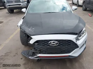 2019 Hyundai Veloster Turbo with VIN KMHTH6AB3KU020193, listed as a IAAI auction lot 41526722 with 54,697 mi miles. Bid and sale history available at carsss.com. Image 6.