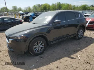 2024 Mazda CX-5 S Carbon Edition z VIN JM3KFBCL8R0489292, wystawiony jako Copart lot #55098625 z przebiegiem 11 132 mil mil oraz Szkody całkowita. Historia ofert i sprzedaży dostępna na DreamBid. Obrazek 1.