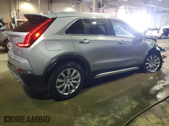 2023 Cadillac XT4 AWD Premium Luxury z VIN 1GYFZDR4XPF109449, wystawiony jako Copart lot #46712405 z przebiegiem 10 882 mil mil oraz Czysty tytuł • Clean title. Historia ofert i sprzedaży dostępna na DreamBid. Obrazek 3.