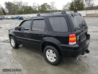 2007 Ford Escape Limited with VIN 1FMYU04117KA50409, listed as a Copart auction lot 87290864 with 239,877 mi miles and Salvage Title. Bid and sale history available at carsss.com. Image 2.
