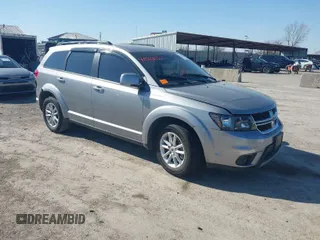 2019 Dodge Journey SE z VIN 3C4PDCBB5KT868424, wystawiony jako IAAI lot #41568055 z przebiegiem 106 212 mil mil oraz . Historia ofert i sprzedaży dostępna na DreamBid. Obrazek 1.