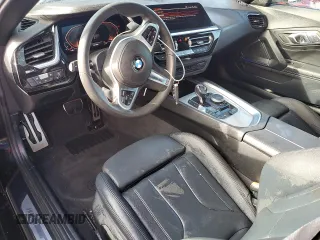 2020 BMW Z4 sDrive30i with VIN WBAHF3C06LWW75400, listed as a Copart auction lot 74297024 with 34,559 mi miles and Salvage Title. Bid and sale history available at carsss.com. Image 8.