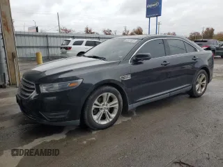 2015 Ford Taurus SEL with VIN 1FAHP2E94FG137935, listed as a Copart auction lot 80921824 with 172,324 mi miles and Salvage Title. Bid and sale history available at DreamBid. Image 1.