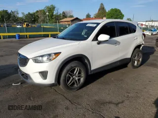2014 Mazda CX-5 Sport z VIN JM3KE4BE6E0361869, wystawiony jako Copart lot #58373595 z przebiegiem 116 019 mil mil oraz Szkoda całkowita • Salvage title. Historia ofert i sprzedaży dostępna na DreamBid. Obrazek 1.