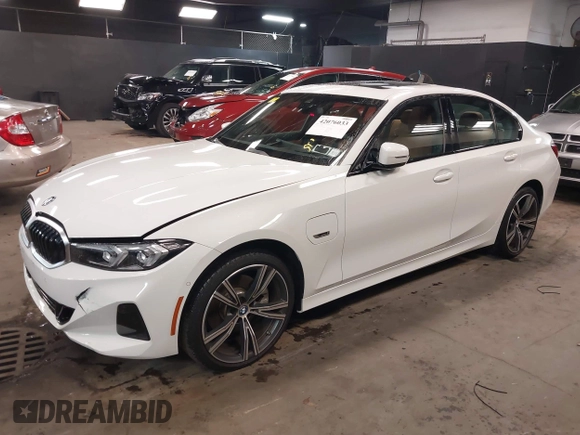 2023 BMW 3 Series 330e xDrive with VIN 3MW39FS05P8D20575, listed as a IAAI auction lot 42076033 with 10,875 mi miles. Bid and sale history available at carsss.com. Image 17.