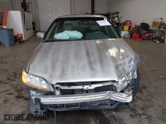 1998 Honda Accord EX z VIN 1HGCG1651WA805964, wystawiony jako IAAI lot #42320827 z przebiegiem 239 279 mil mil oraz . Historia ofert i sprzedaży dostępna na DreamBid. Obrazek 13.