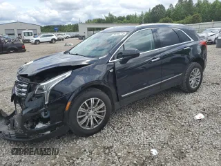 2019 Cadillac XT5 Luxury FWD with VIN 1GYKNCRS7KZ104400, listed as a Copart auction lot 58704715 with 80,676 mi miles and Salvage title. Bid and sale history available at DreamBid. Image 1.