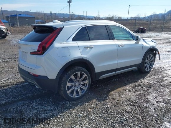 2020 Cadillac XT4 AWD Premium Luxury z VIN 1GYFZDR45LF016381, wystawiony jako IAAI lot #41556874 z przebiegiem 23 887 mil mil oraz . Historia ofert i sprzedaży dostępna na DreamBid. Obrazek 4.
