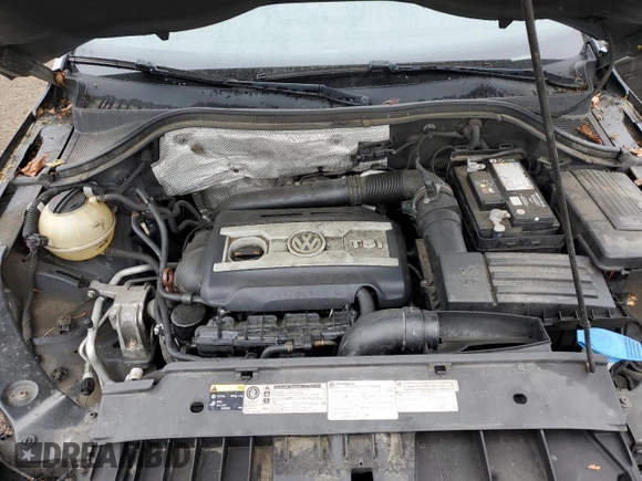 2013 Volkswagen Tiguan SE z VIN WVGBV7AX6DW550316, wystawiony jako Copart lot #56964595 z przebiegiem 157 526 mil mil oraz Szkoda całkowita • Salvage title. Historia ofert i sprzedaży dostępna na DreamBid. Obrazek 11.