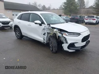 2024 Honda HR-V EX-L with VIN 3CZRZ2H70RM717058, listed as a IAAI auction lot 41908674 with 8,414 mi miles and . Bid and sale history available at DreamBid. Image 1.