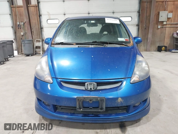2007 Honda Fit Sport z VIN JHMGD38687S053880, wystawiony jako IAAI lot #42436181 z przebiegiem 124 076 mil mil oraz . Historia ofert i sprzedaży dostępna na DreamBid. Obrazek 6.
