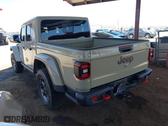 2022 Jeep Gladiator Rubicon with VIN 1C6JJTBG2NL164117, listed as a IAAI auction lot 42450350 with 22,326 mi miles and . Bid and sale history available at DreamBid. Image 3.