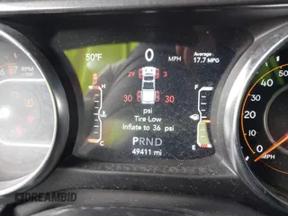 2022 Jeep Gladiator Texas Trail z VIN 1C6HJTAG8NL152487, wystawiony jako IAAI lot #41053737 z przebiegiem 49 411 mil mil oraz . Historia ofert i sprzedaży dostępna na DreamBid. Obrazek 7.
