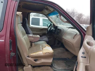 1997 Ford F-150 с VIN 1FTDX08W4VKD39667, выставлен на аукционе IAAI как лот 41537371 с пробегом 300 671 миль миль и . История ставок и продаж доступна на DreamBid. Изображение 5.