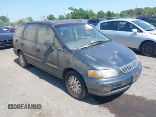 1997 Honda Odyssey EX with VIN JHMRA1879VC014933, listed as a IAAI auction lot 42577872 with 235,083 mi miles and . Bid and sale history available at DreamBid. Image 1.