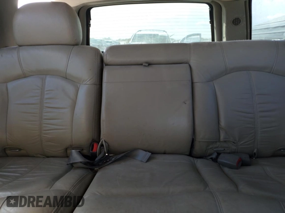 2002 Chevrolet Tahoe LT with VIN 1GNEK13Z82R245652, listed as a Copart auction lot 71496024 with 155,869 mi miles and Salvage Title. Bid and sale history available at carsss.com. Image 10.