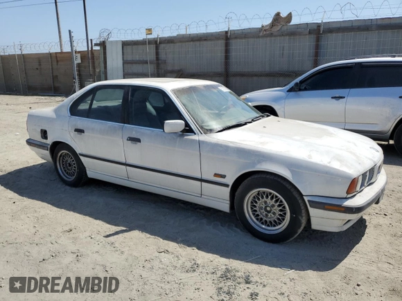 1995 BMW 5 Series 525i z VIN WBAHD6324SGK57242, wystawiony jako Copart lot #57287605 z przebiegiem Nie podano mil oraz Czysty tytuł • Clean title. Historia ofert i sprzedaży dostępna na DreamBid. Obrazek 4.