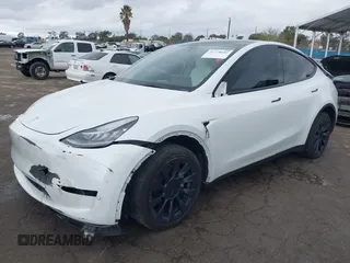 2023 Tesla Model Y Long Range with VIN 7SAYGDEE1PA106057, listed as a IAAI auction lot 41778642 with 1 mi miles. Bid and sale history available at carsss.com. Image 2.