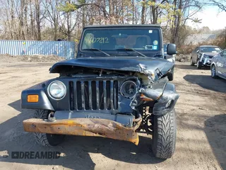 2003 Jeep Wrangler X with VIN 1J4FA39S53P362991, listed as a IAAI auction lot 41607212 with 240,556 mi miles. Bid and sale history available at carsss.com. Image 12.