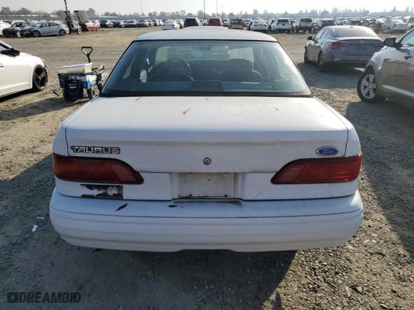 1993 Ford Taurus GL with VIN 1FALP5247PG143248, listed as a Copart auction lot 83922634 with 605,096 mi miles and Salvage Title. Bid and sale history available at carsss.com. Image 6.