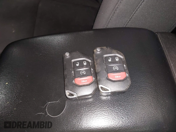 2019 Jeep Wrangler Unlimited Sport Altitude with VIN 1C4HJXDGXKW505396, listed as a IAAI auction lot 42039985 with 146,178 mi miles and . Bid and sale history available at DreamBid. Image 11.
