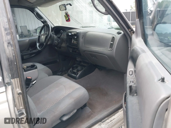 2003 Mazda B-Series 2WD Truck SE with VIN 4F4YR46VX3TM16294, listed as a IAAI auction lot 42034107 with 165,007 mi miles. Bid and sale history available at carsss.com. Image 5.