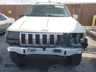 1998 Jeep Grand Cherokee Laredo with VIN 1J4GZ58S6WC319444, listed as a Copart auction lot 53147665 with 217,068 mi miles and Salvage Title. Bid and sale history available at carsss.com. Image 5.
